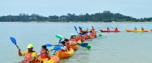Bautismo en Kayak con interpretación de Conchas Marinas
